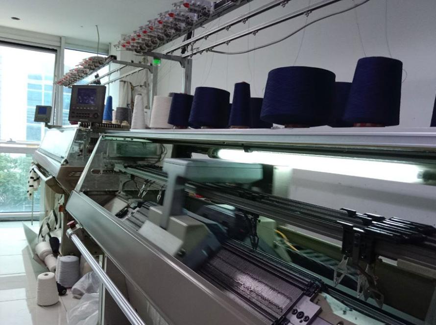 UBBA Textile's production team working diligently in Istanbul workshop.